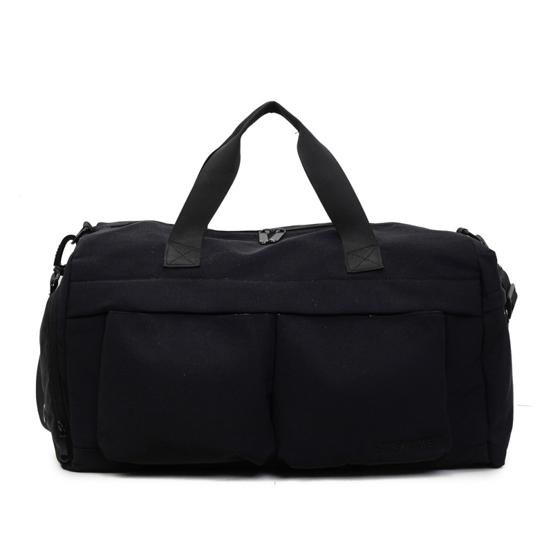 Nueva bolsa de viaje portátil simple y versátil, bolsa de equipaje de gran capacidad para mujeres, bolsa deportiva leve y casual de alta calidad.