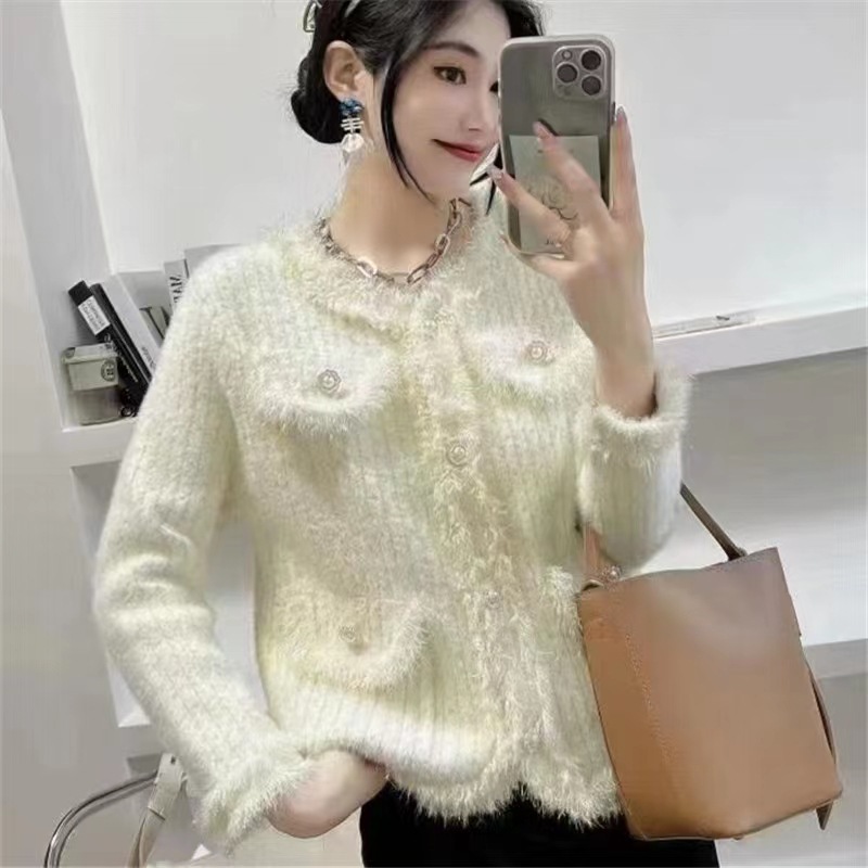 24 invierno Puyuan estilo francés blanco imitación de agua abrigo de invierno de mujeres nuevo estilo de alta calidad