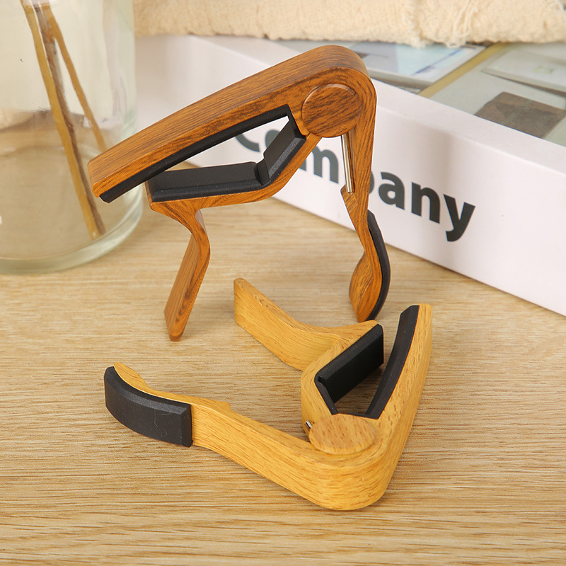 Guitarra de madera folk guitarra eléctrica ukulele universal de aleación de aluminio de madera