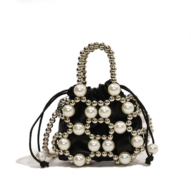 Versión coreana del nuevo estilo de verano bolso de mensajero para niños lindo perla bolso para niños y niñas mini bolso de hombro para niñas de estilo occidental