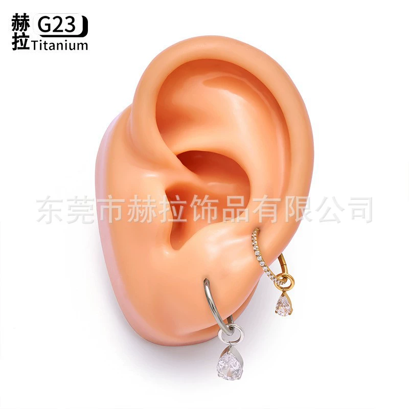 Pendant drop-shaped with zircon, earrings, piercing