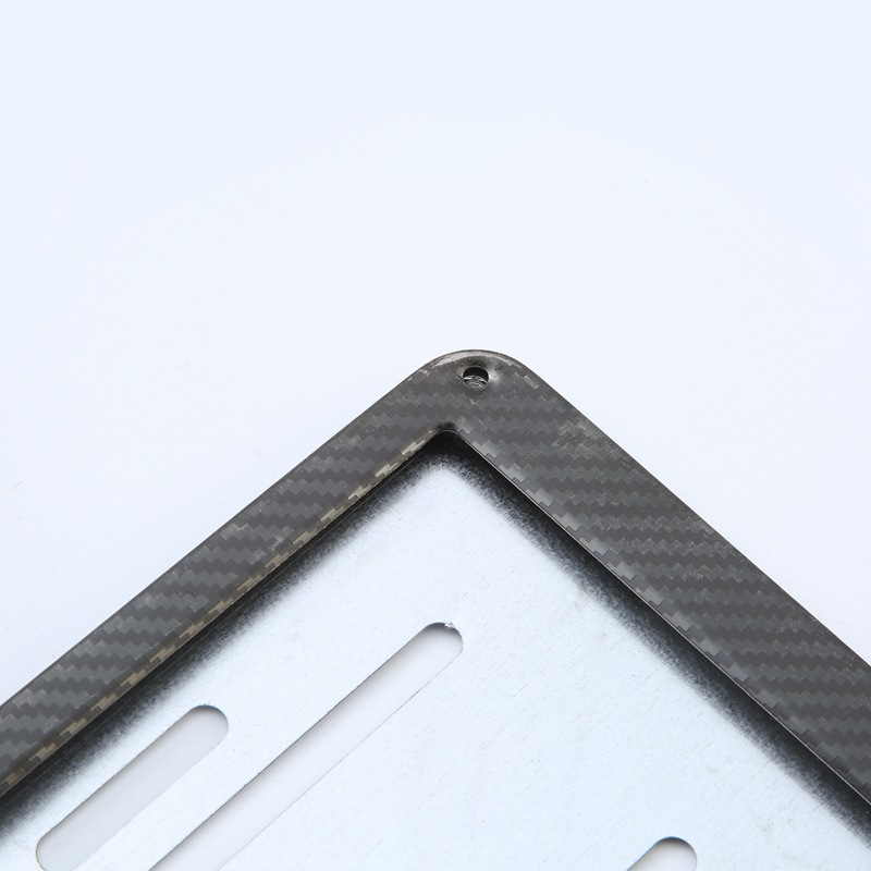 Los fabricantes de Venta caliente transfronterizos suministran Marco de placa de matrícula de coche de fibra de carbono de acero inoxidable Marco de placa de matrícula de coche antirrobo decorativo estándar estadounidense image 6