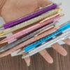 7PCS Funny Pens Interesting Pens 7 One set of ballpoint pen suits Golden powder round bead pen Press the ballpoint pen