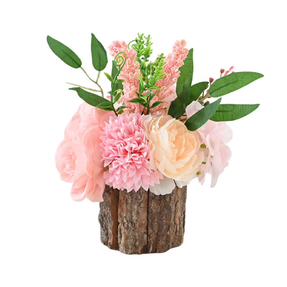 Pequeña planta con base de madera