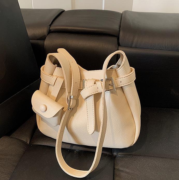 Bolso de cubo de aire extranjero de tendencia transfronteriza para mujer 2025 nuevo bolso de mensajero de viaje casual bolso de hombro de axila de moda de todo fósforo