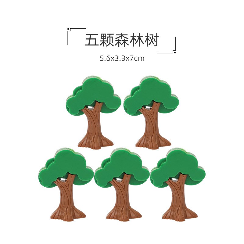 Five plastic forest trees