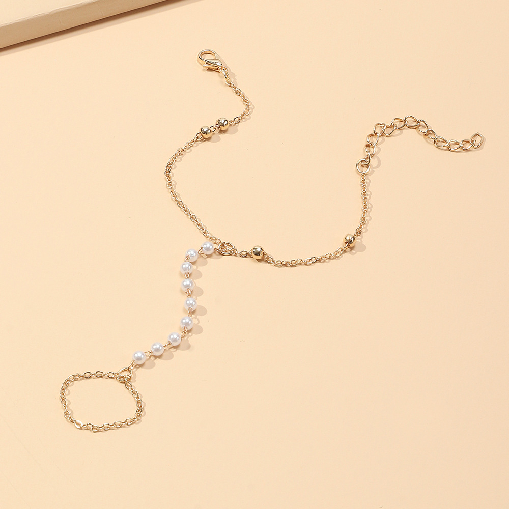 fashion one-piece pearl metal chain ring bracelet