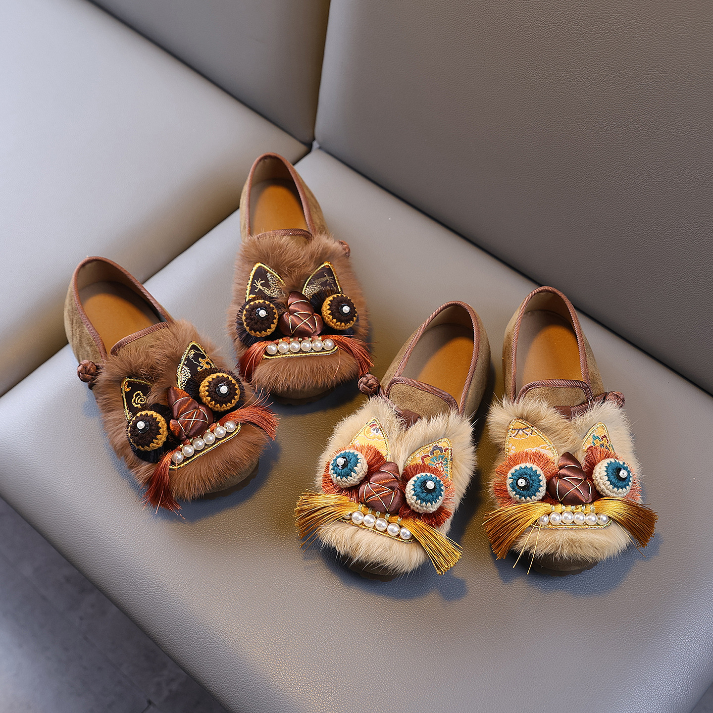 Traditional Chinese-style women's shoes with a tiger head design, featuring genuine rabbit fur embellishments, a retro ethnic style, and a flat sole
