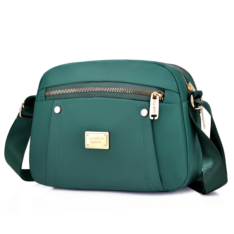 Bolsa de mensajero de tela Oxford para mujer 2023 nueva primavera de mediana edad para mujer bolsa de viaje de gran capacidad hombro nylon madre bolsa todo a juego