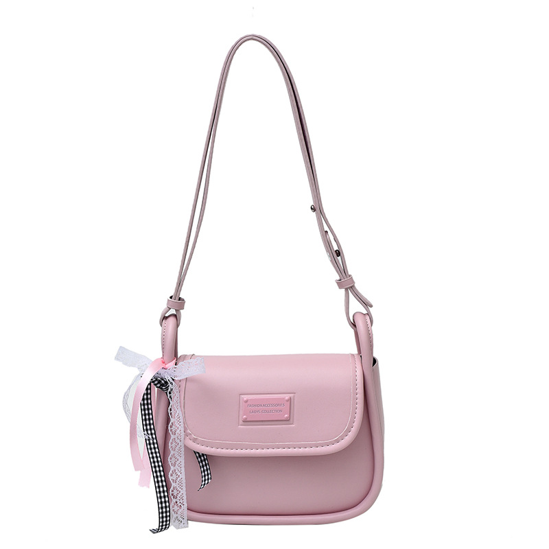 Bolsos de cercanías de nicho de ocio para mujer 2025 nueva primavera y verano bolso de hombro de diseño simple moda bolso de mensajero de todo fósforo