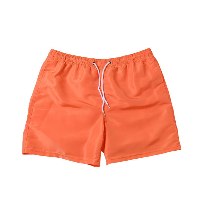 Pantalones de playa de vacaciones junto al mar para hombres transfronterizos de piel de melocotón de cuatro puntos de tamaño europeo suelto con forro de natación y surf para hombres