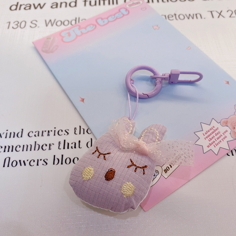 HD843A025 tela de otoño púrpura relleno de algodón muñeca llavero colgante bolso colgante de teléfono móvil