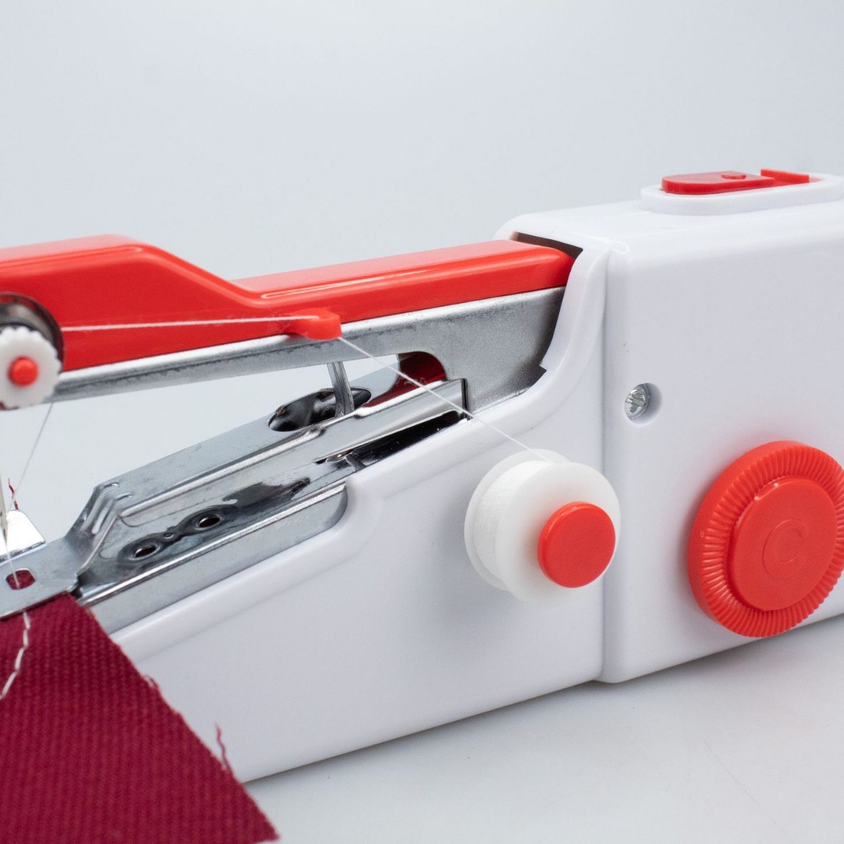 Máquina de coser eléctrica portátil mini simple de mano suministrada por fabricantes Máquina de coser eléctrica mini de bolsillo doméstica