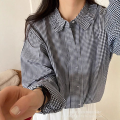 キキは長袖のシャツの女性の春2025の新型のレトロな子供の襟のデザイン感の小さい大衆のシャツの上着を描きます。