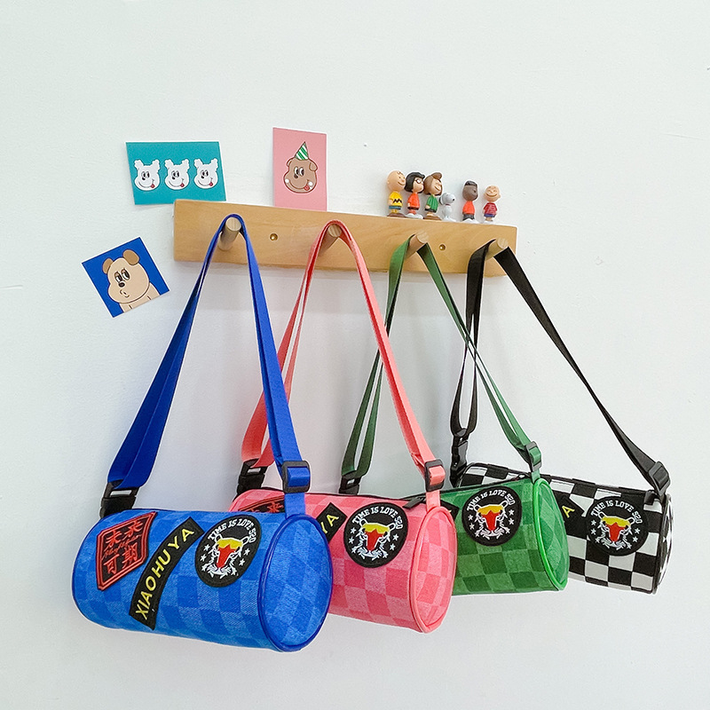 Nuevo bolso de mujer vaquero de primavera 2025 versión coreana del tablero de ajedrez bolso de hombro único cubo de agua bolso de padres e hijos