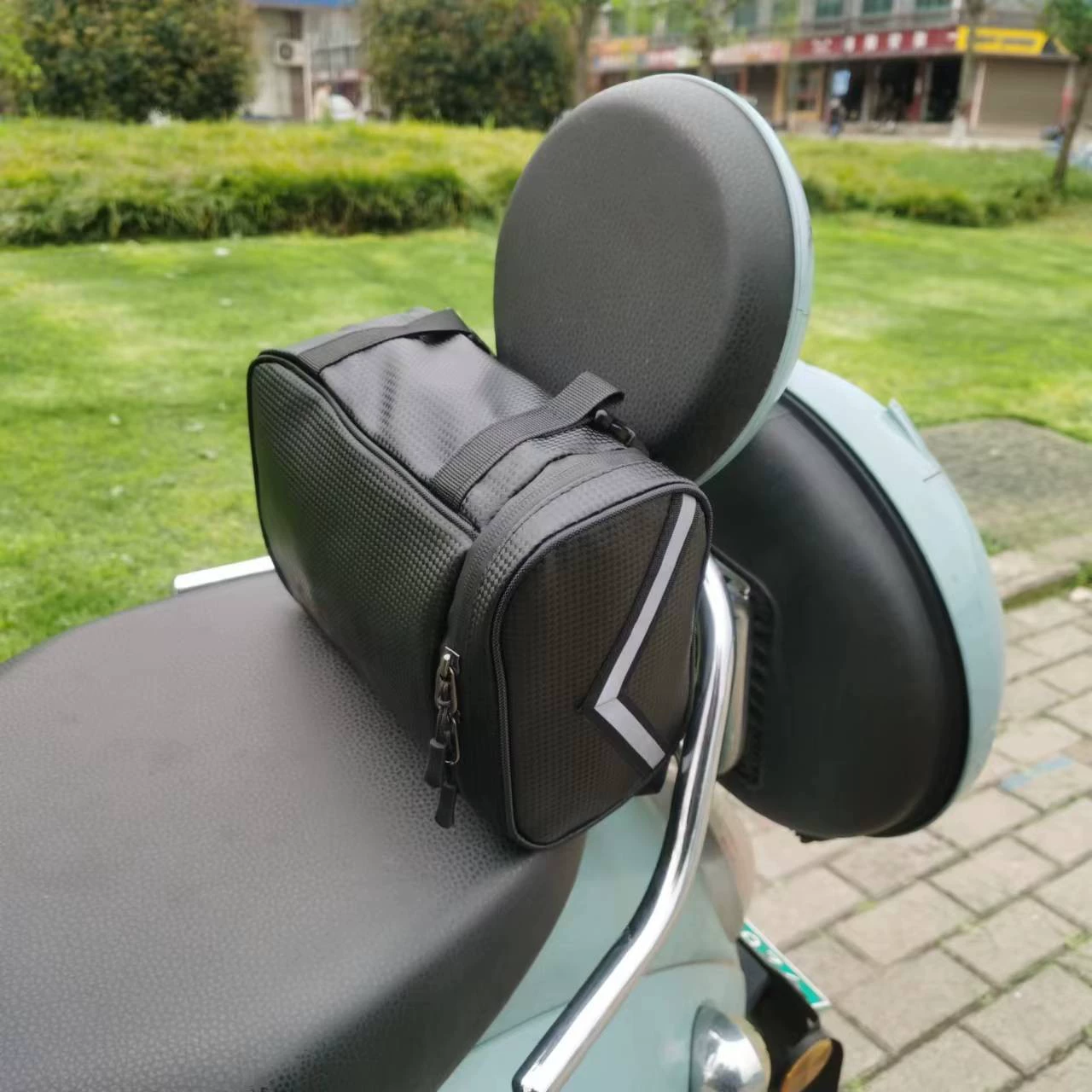 Electric bike, storage system, bag, helmet
