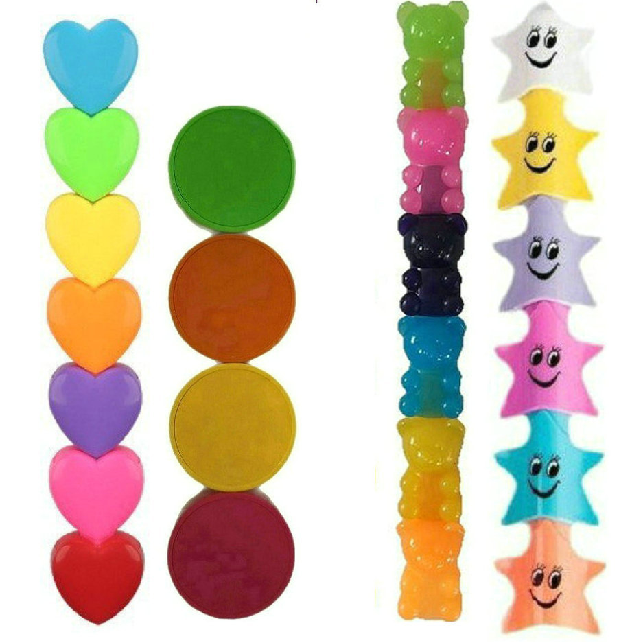 Artículos de papelería: juguete de oso de varias piezas, agenda para niña, bloques de Tetris, corazón, calamar, conejo, oso, rotulador fluorescente.