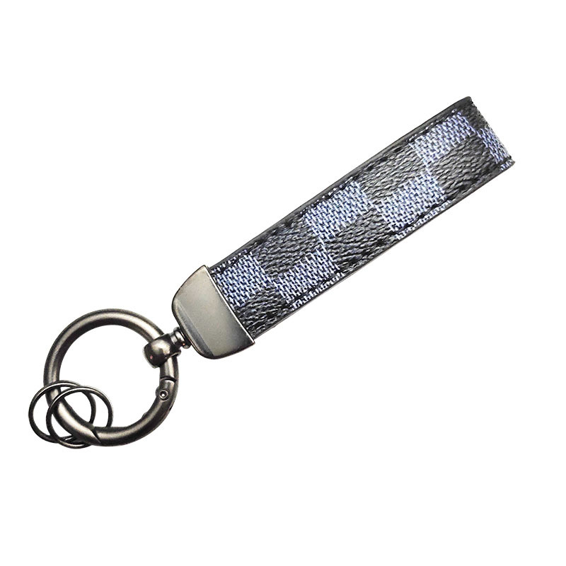 Marca de moda presbicia cuero coche llavero hombres llavero coche cintura colgando herradura hebilla fuerte resistente al desgaste fábrica ventas directas