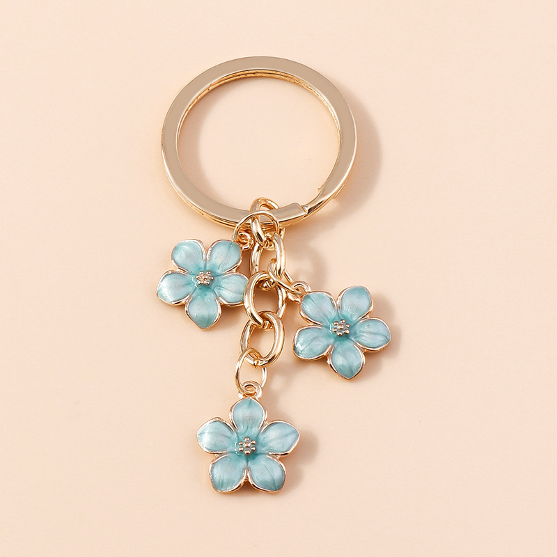 Dulce chica corazón flor de cerezo llavero simple Flor del ciruelo flor teléfono móvil bolso colgante decorativo joyería