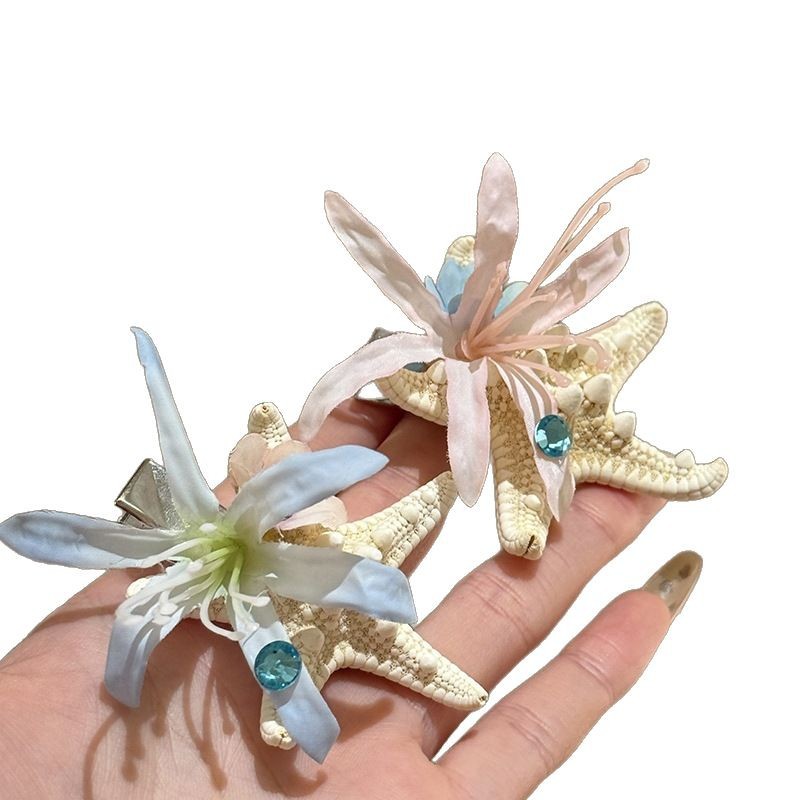 Flor de tela con incrustaciones de diamantes Horquilla de estrella de mar Estilo de vacaciones junto al mar Clip de pico de pato lateral Viajes Fotografía Moda Accesorios para el cabello de todo fósforo