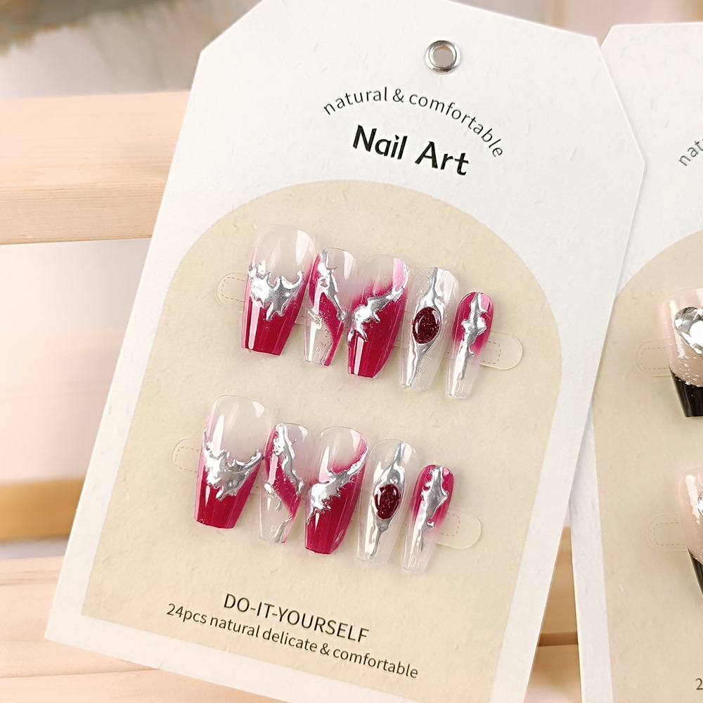 Arte de uñas al por mayor para Año Nuevo, arte de uñas hecho a mano con tendencia nacional roja del Año de la Serpiente, pegatinas de uñas con efecto ojo de gato y fuegos artificiales con un toque de alta gama.