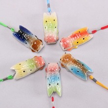 陶瓷口哨小蝉知了哨子四孔笛子小挂件旅游景点夜市公园热销小摆件