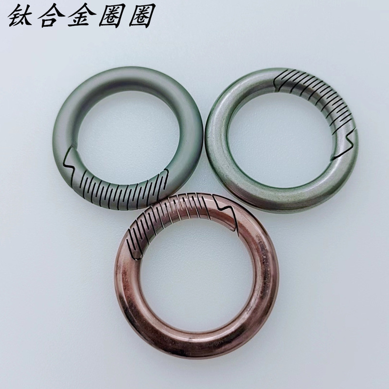 Titanium alloy key chain car key ring accessories men and women key chain personality doll pendant creative key ring