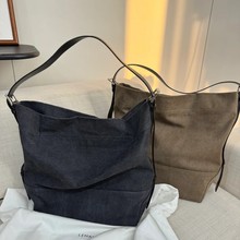 明星同款高质感帆布包2025夏日新款大容量托特包通勤包单肩腋下包
