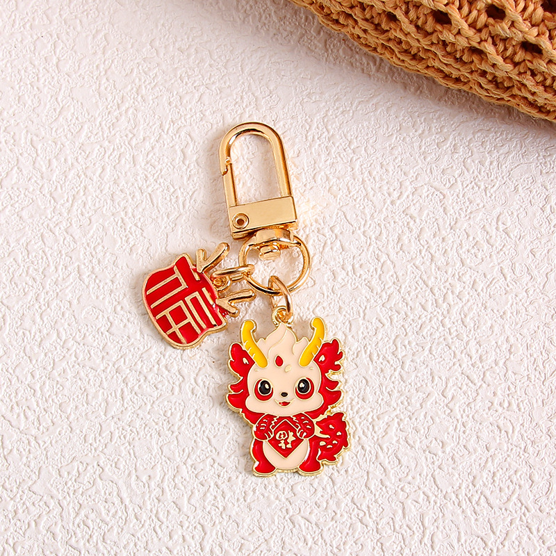 Año nuevo estilo nacional dragón año metal llavero lindo dibujos animados koi bolsa colgante airpods simple joyería colgante