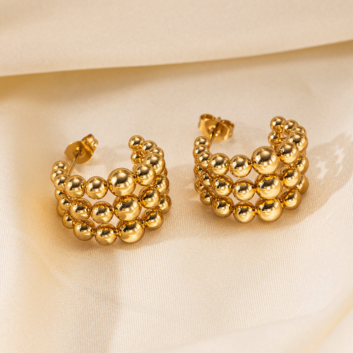 Taena Pendientes de acero inoxidable europeos y americanos, lujo ligero, costura redonda de alta calidad, pendientes semicirculares de acero de titanio, joyería femenina que no se desvanece
