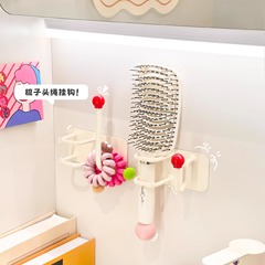 トイレの髪輪のカチューシャのひもは浴室の壁掛けの収納棚をフックします。