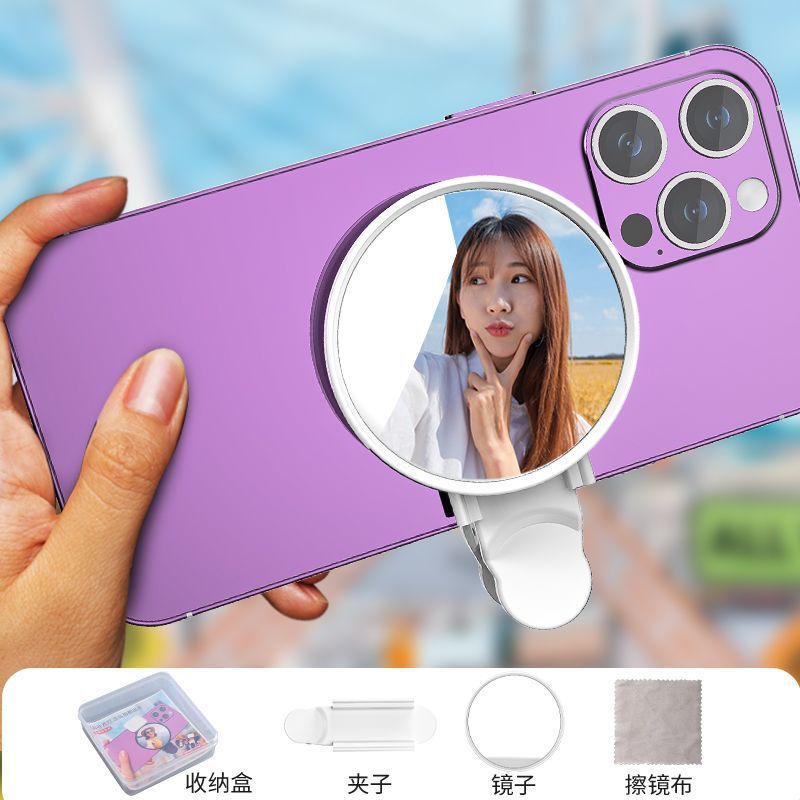 写真を撮る携帯電話の後ろには、自分で写真を撮るカメラがあります。|undefined