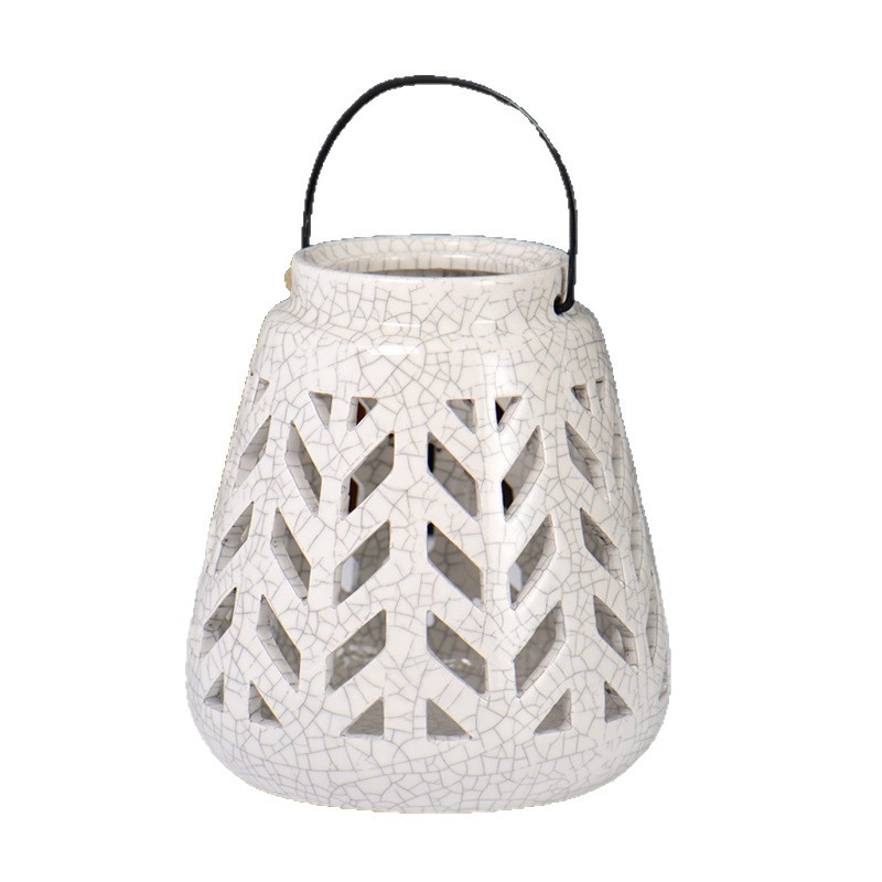 Moderno y simple cerámica nórdica LED linterna hueca vela candelabro decoración interior ligero de lujo lámpara de viento
