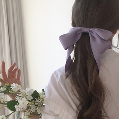 春の花の青いスプリングはフランス式の超アンドロメダの森系の蝶結びのリボンを挟みます。