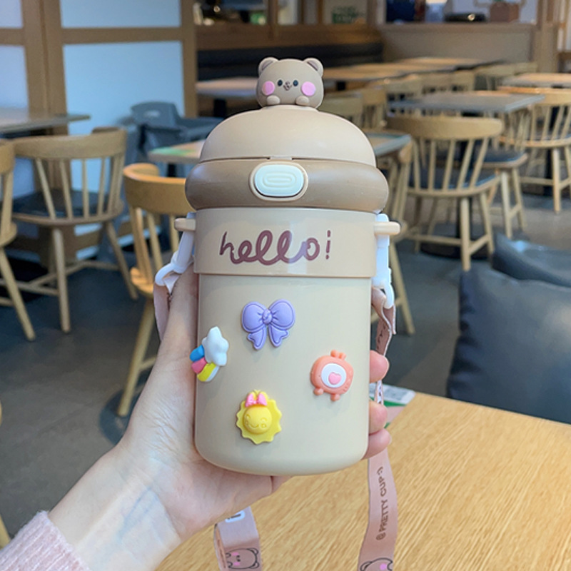 Botón rebote Taza de aislamiento de vidrio de doble capa anti-escaldado Taza de agua Linda etiqueta 3D correa de la Copa de paja taza portátil