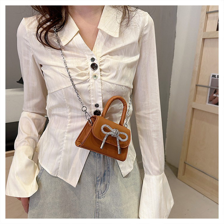 Ins niche French textured bag female 2024 new bow small square bag stylish shoulder messenger bag_voghion.com