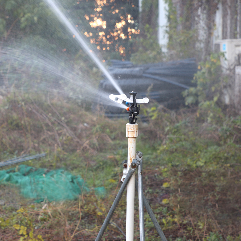 Boquilla de rociador de brazo oscilante blanca doble boquilla 4 puntos ajustable y controlable boquilla de rociador de jardín para el riego de polvo sin impuestos