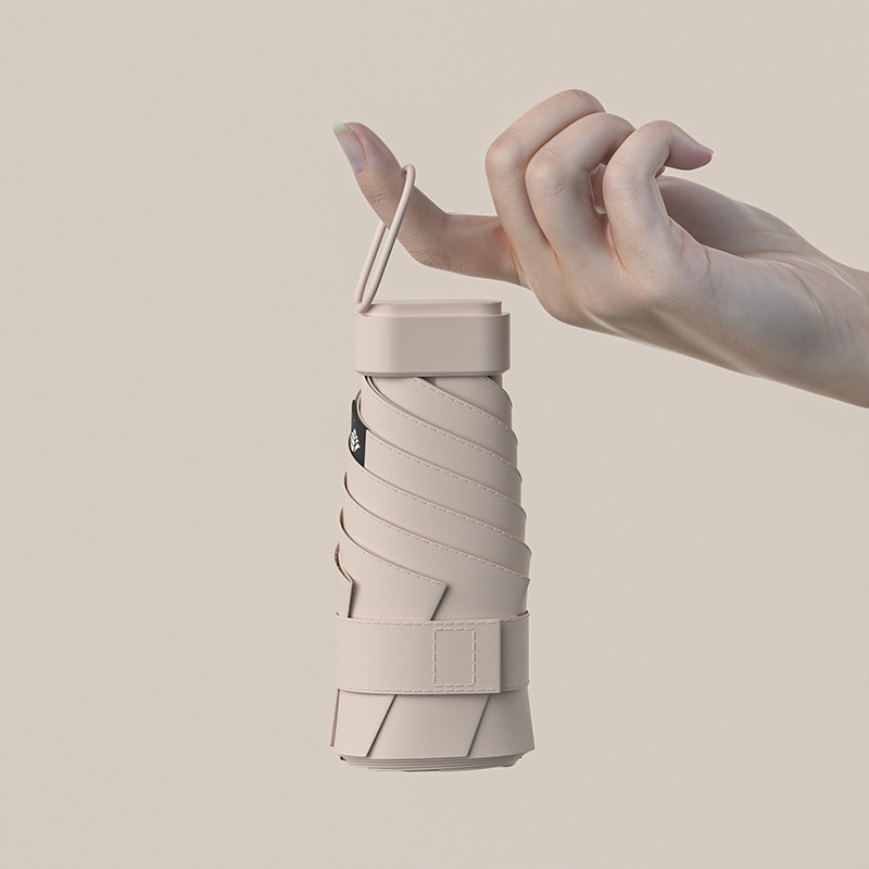 Paraguas de protección solar de vinilo creativo mini paraguas de seis pliegues paraguas de cápsula de bolsillo pequeño para mujer lluvia y lluvia paraguas de sol de doble uso