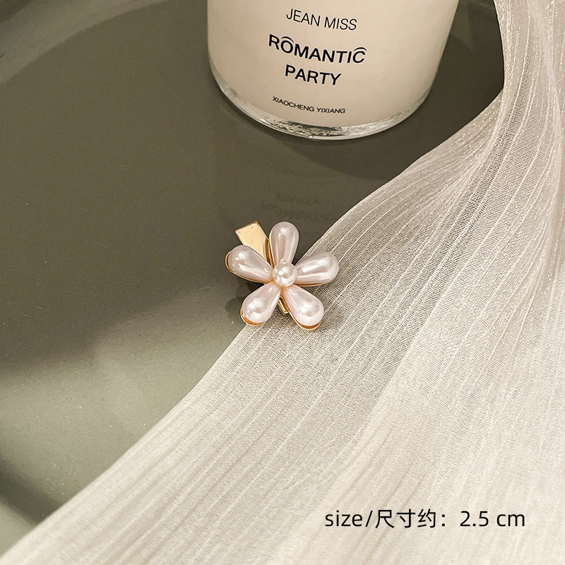 Corea del Sur clip para el cabello de perlas en línea clip para el cabello de mujeres rasgadas clip para el cabello de una palabra clip para el cabello de bordes fría BB clip lateral clip para el temperamento clip para la cabeza