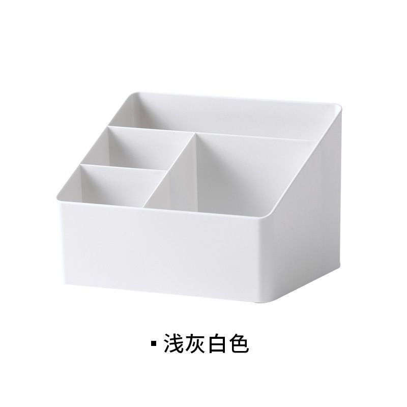 La Sala de estar del dormitorio de la esquina perezosa tiene una caja de almacenamiento de escritorio de oficina de plástico multifuncional y una caja de almacenamiento de cosméticos.