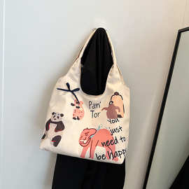 帆布托特包2024春季新款简约大容量单肩包卡通印花女包包2024新款