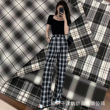 现货供应 仿TR四面弹黑白格子裤子面料 手感柔软 西裤外套布料