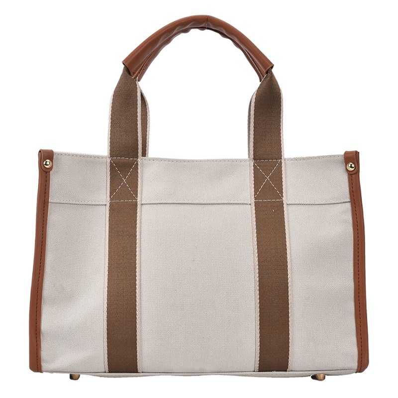 Bolso de mano simple de lona para mujer 2021 Nuevo bolso portátil de moda de estilo coreano bolso de mensajero de hombro de comercio exterior transfronterizo