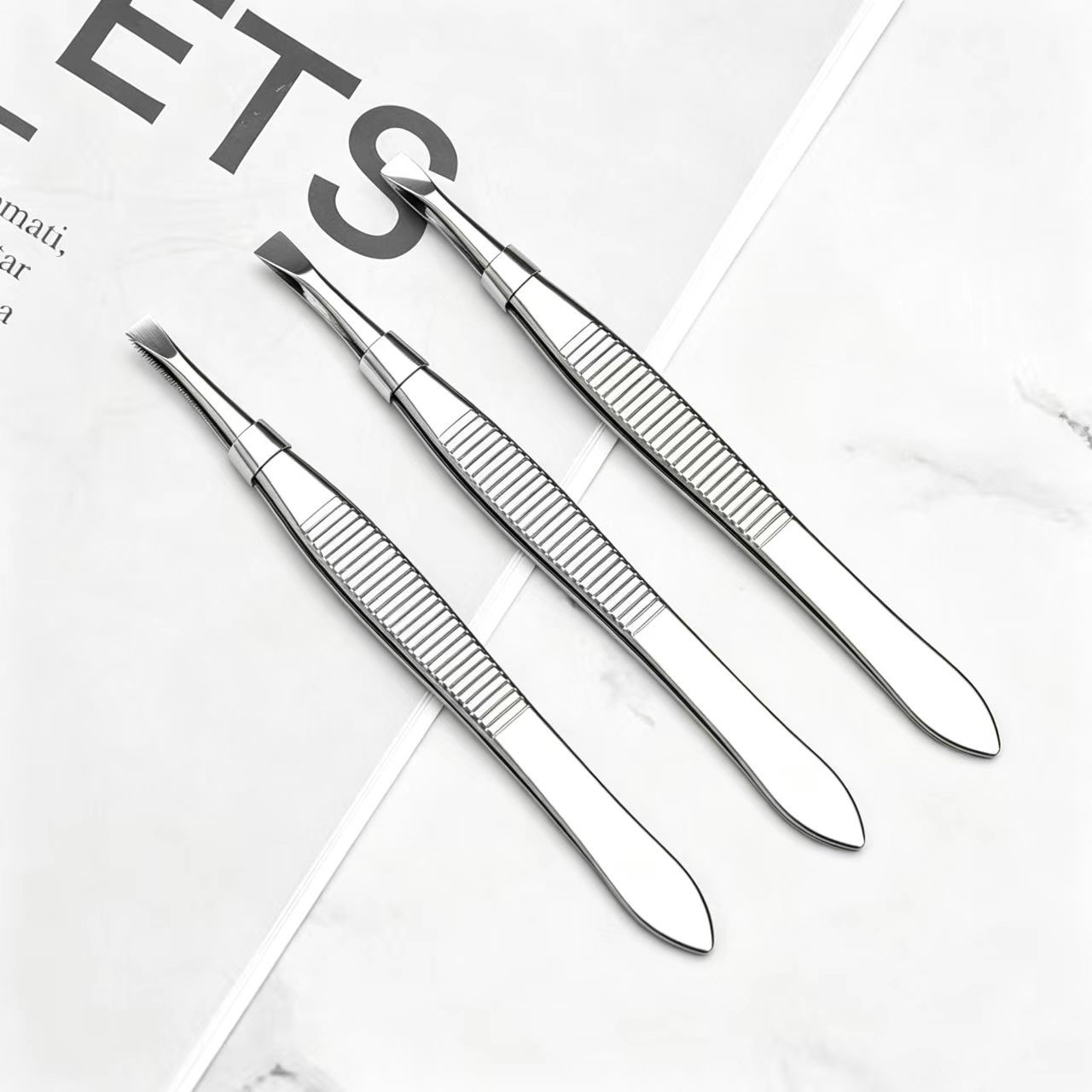 Slanted stainless steel eyebrow clips Eyebrow clips Pulling eyebrow…