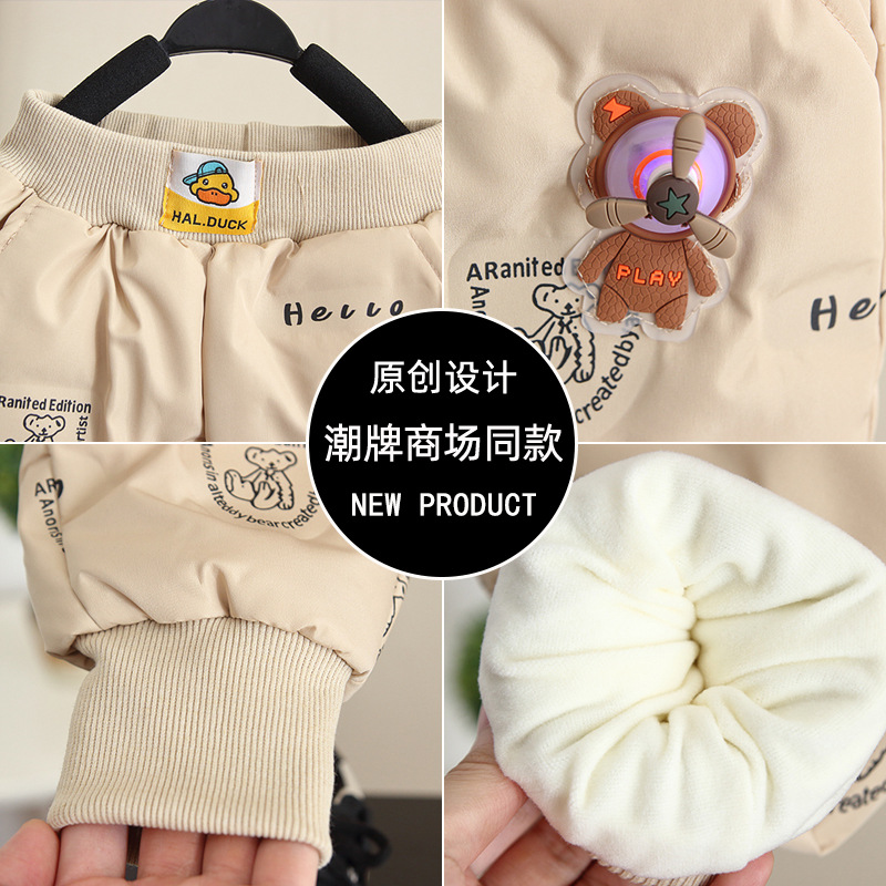 6911 pantalones de plumón de pato blanco para niños 2025 invierno nuevo niño pequeño patito amarillo pantalones gruesos de algodón para bebés marea