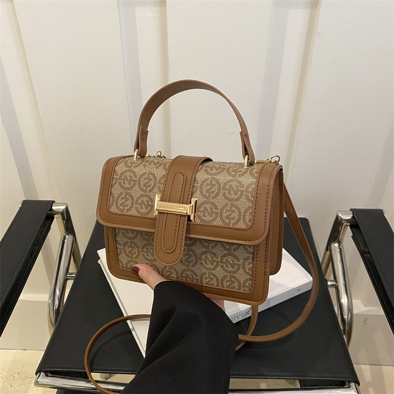 Bolsa de mano de moda coreana de moda 2025, primavera nueva bolsa de hombro de viaje de moda retro impresión mochila