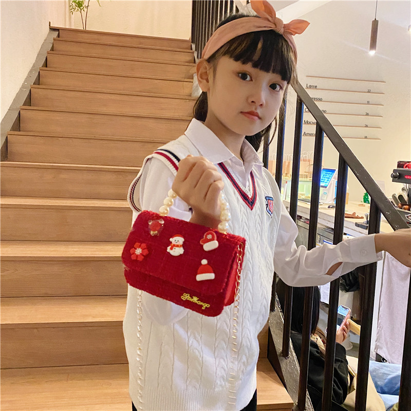 Mini moda para niñas bolso de cambio de perlas 2024 nuevo patrón de moda coreana bolso de ropa infantil