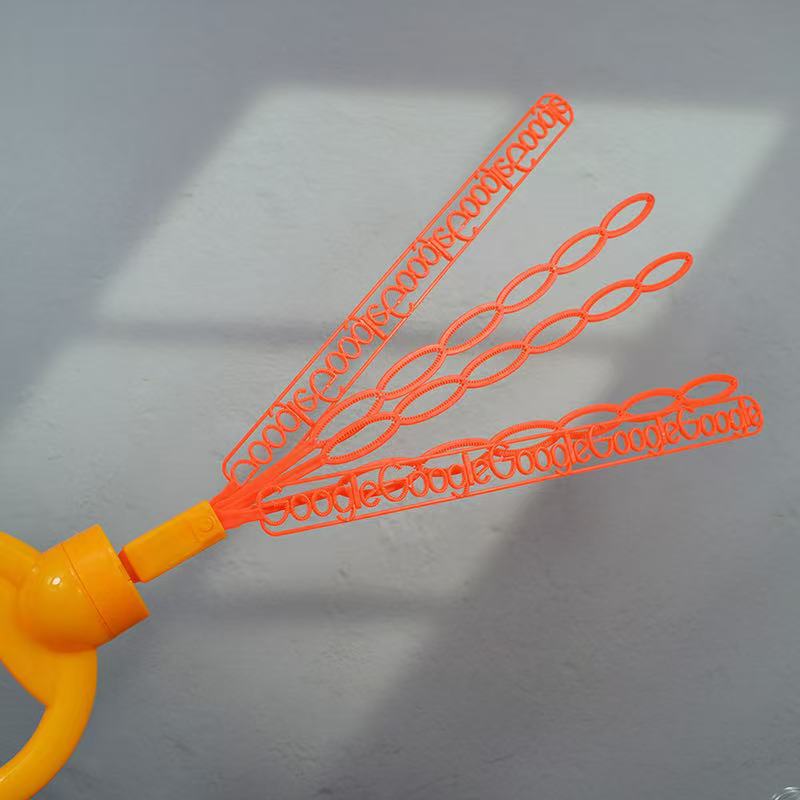 Máquina de burbujas con cara sonriente – diseño de cinco garras y 32 orificios, potente y divertida