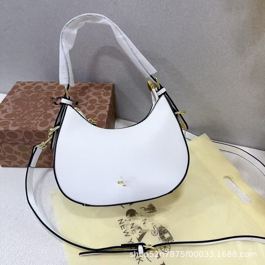 2023新型潮クロスボーダー対外貿易女性バッグ腋の下三日月包復古老花手提げシングル肩斜めショルダーバッグロゴ付き