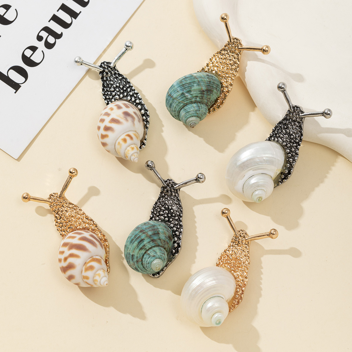 Factory direct gold-plated silver-plated alloy inlaid natural conch snail brooch pendant